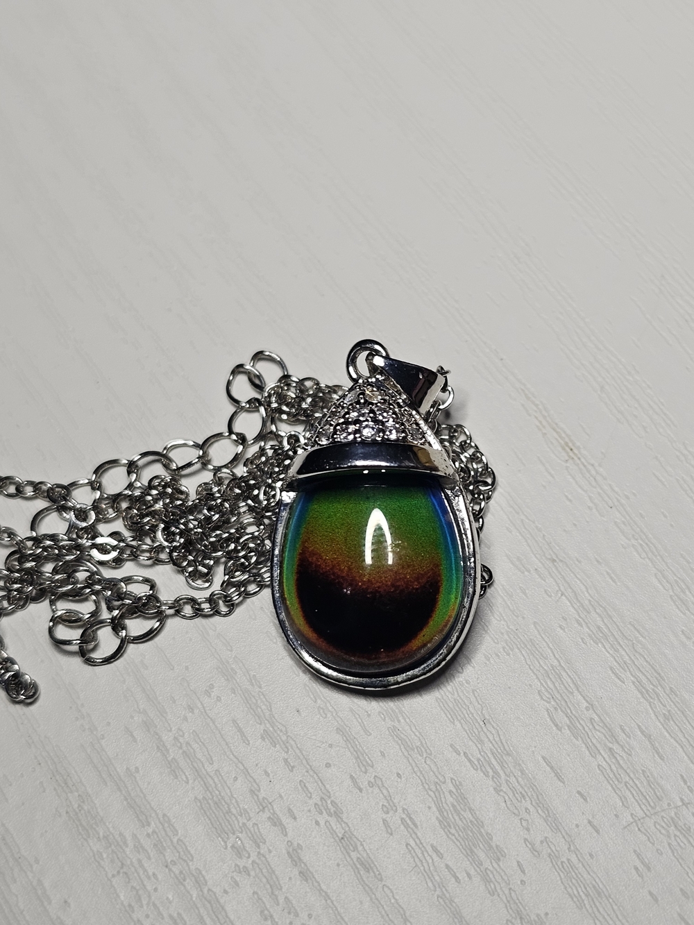 Simulated Magic Color Topaz With Simulated Diamond Teardrop Pendant